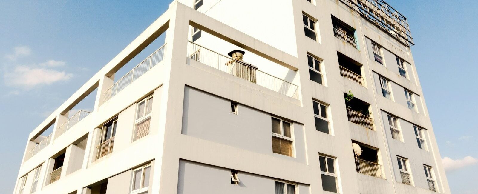 white concrete building under blue sky during daytime